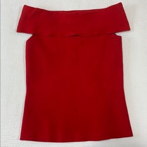 Red off-shoulder blouse.